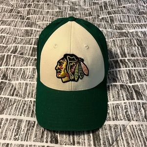 Green Chicago Blackhawks hat.